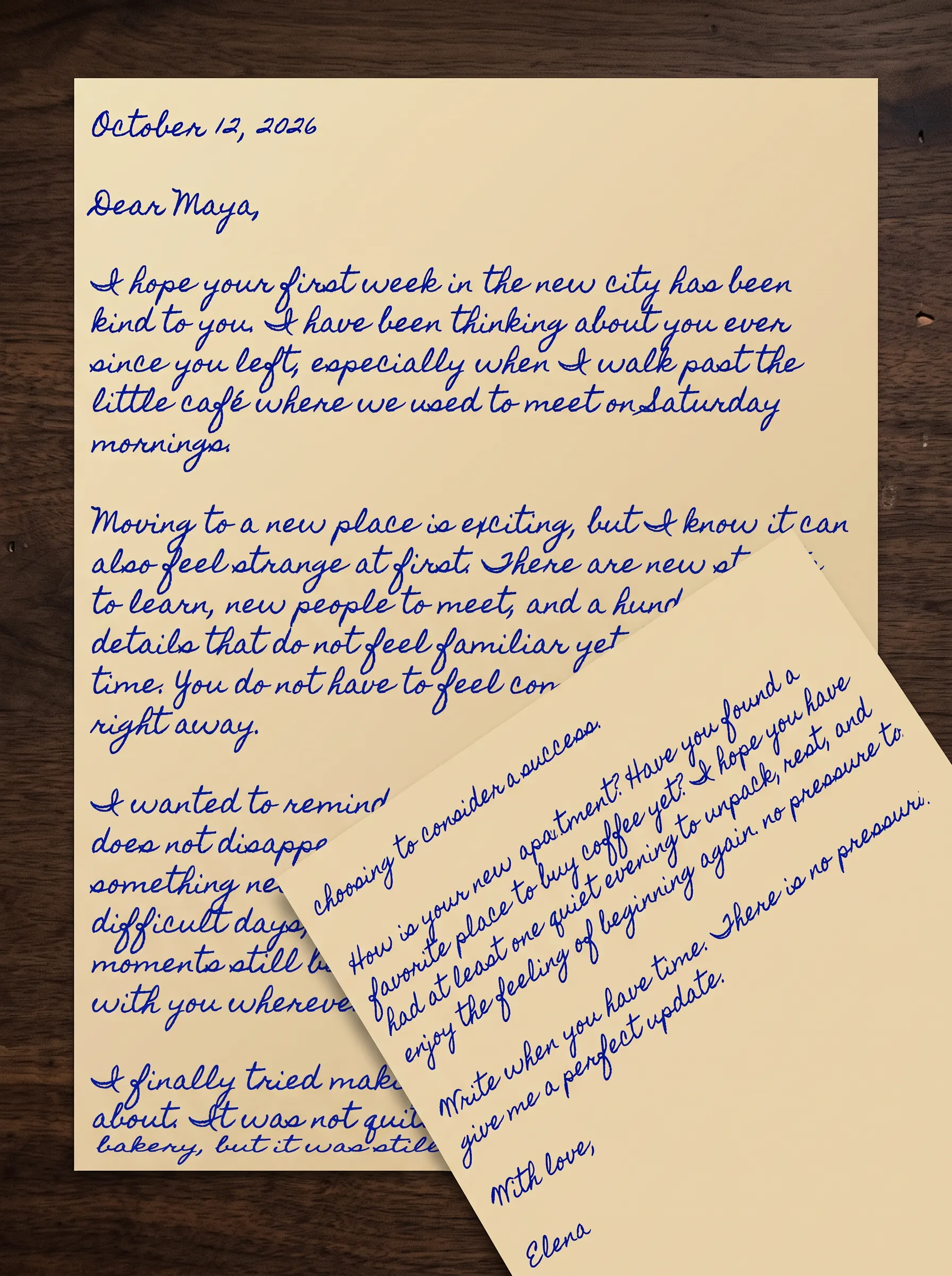 handwritten personal letter on aged paper beside an envelope
